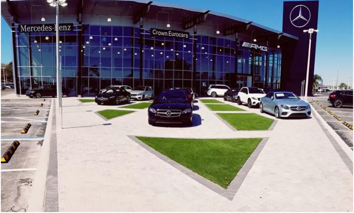 Easy to maintain turf grass utilized in a commercial lot | Nampa Floors