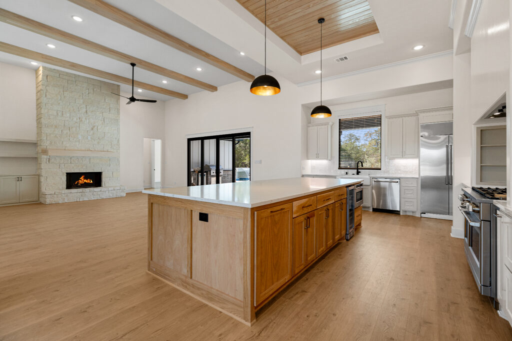 Laminate flooring brown style in the kitchen open setting by Nampa Floors in Boise, ID Nampa, ID.
